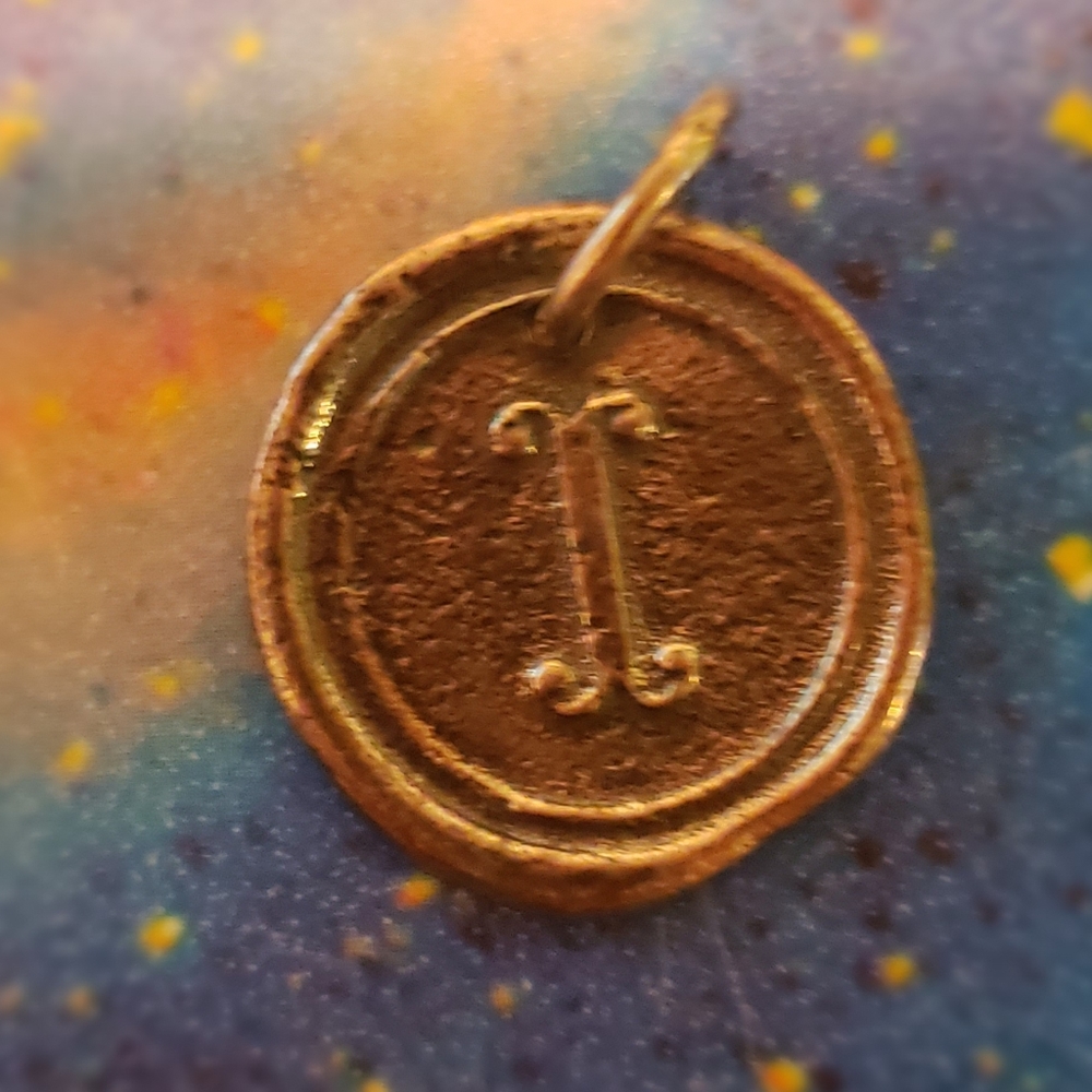 Waxing Poetic Initial Charm